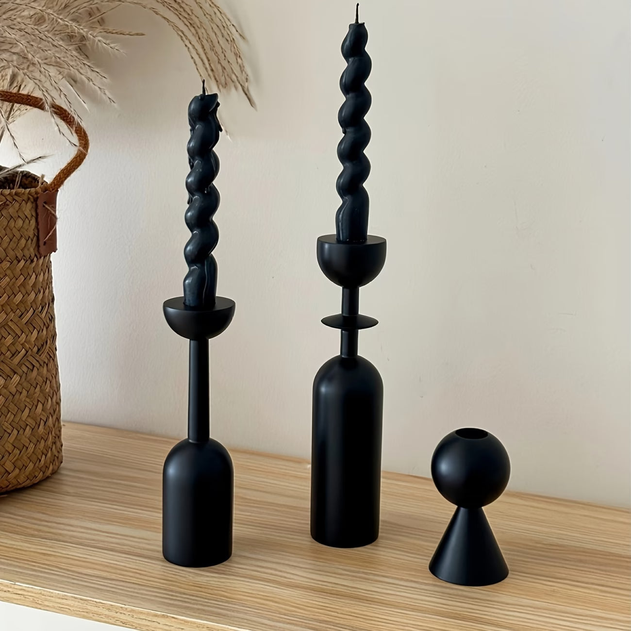 Interior detail of Black twisted candle holders on a white surface for showing Elegant Black Wooden Candle Holders – Set of 3 Candle Accessories