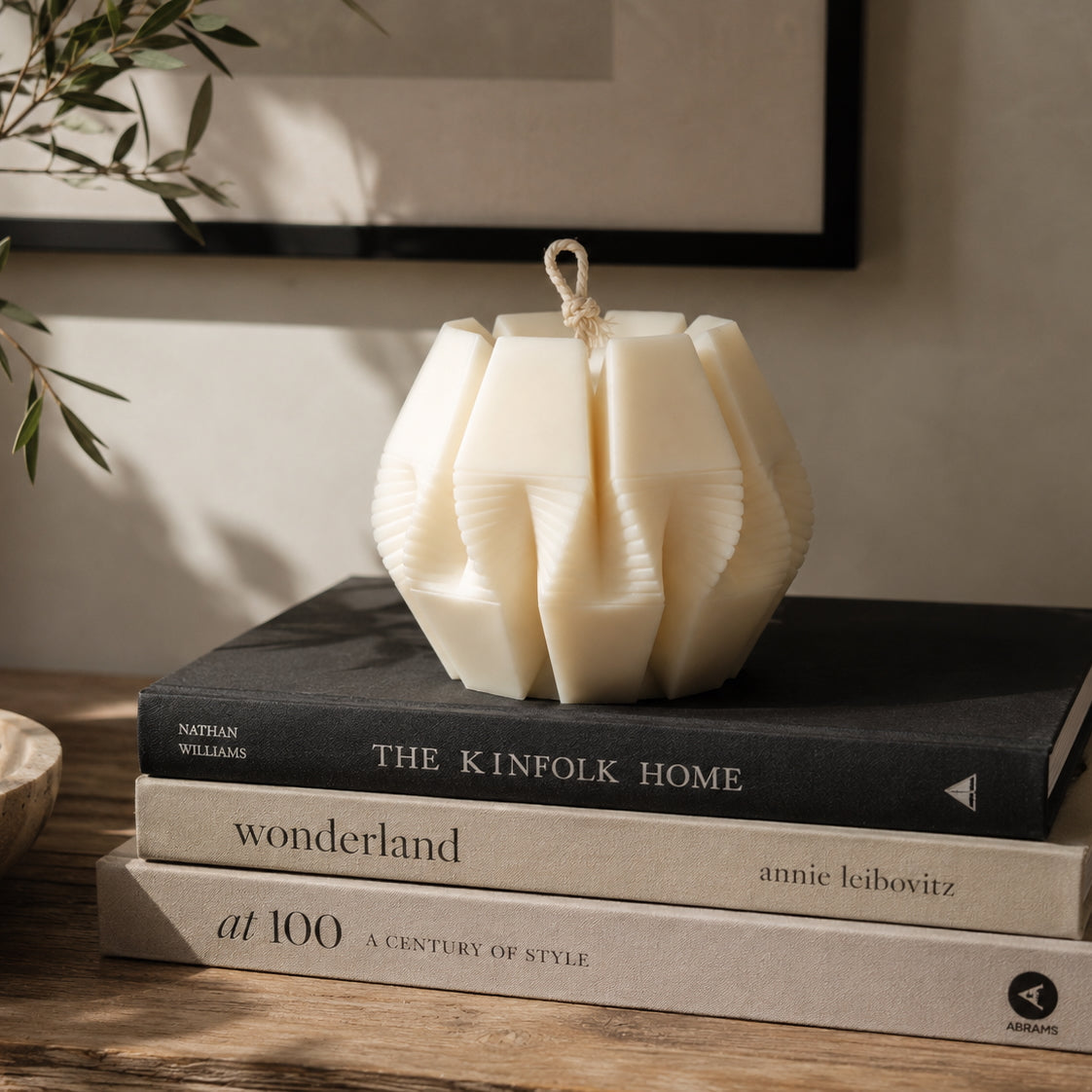 Nexus Pillar Candle in premium natural ivory wax, featuring a modern geometric sculptural design. Hand-poured in London as a luxury decorative candle for contemporary home interiors.