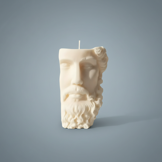 Warm Warren London Candle - shaped like a classical Zeus bust on a neutral background. Artisan handmade Candle