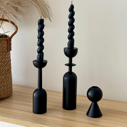 Interior detail of Black twisted candle holders on a white surface  for showing Elegant Black Wooden Candle Holders –  Set of 3 Candle Accessories