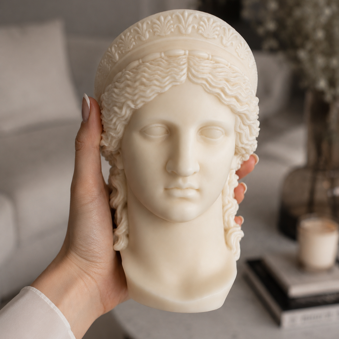 See the true size of our handmade Medusa Goddess Bust sculpture candle in hand. Crafted in London from natural soy wax, it's a thoughtful luxury gift for art lovers, housewarmings and special occasions.